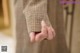 A close up of a person's hand holding something.